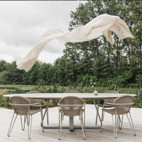 CURVE - table ovale en céramique travertin